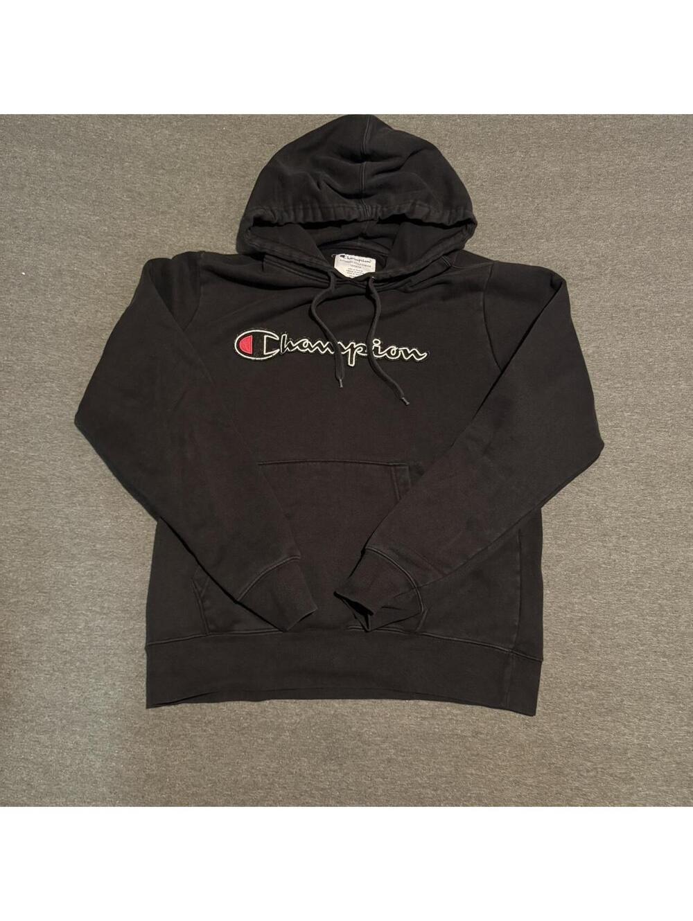 Black Champion hoodie two small bleach spots on pocket